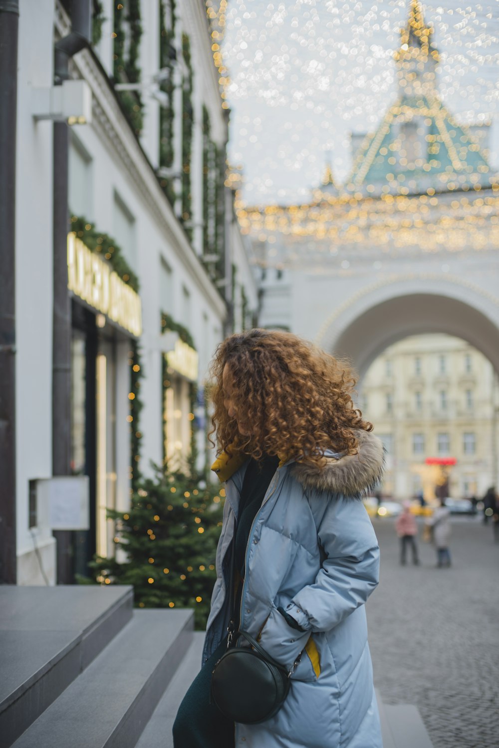 people near buildings during day