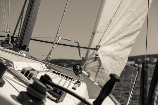 grayscale photography of yacht on body of water in Härnösand Sweden