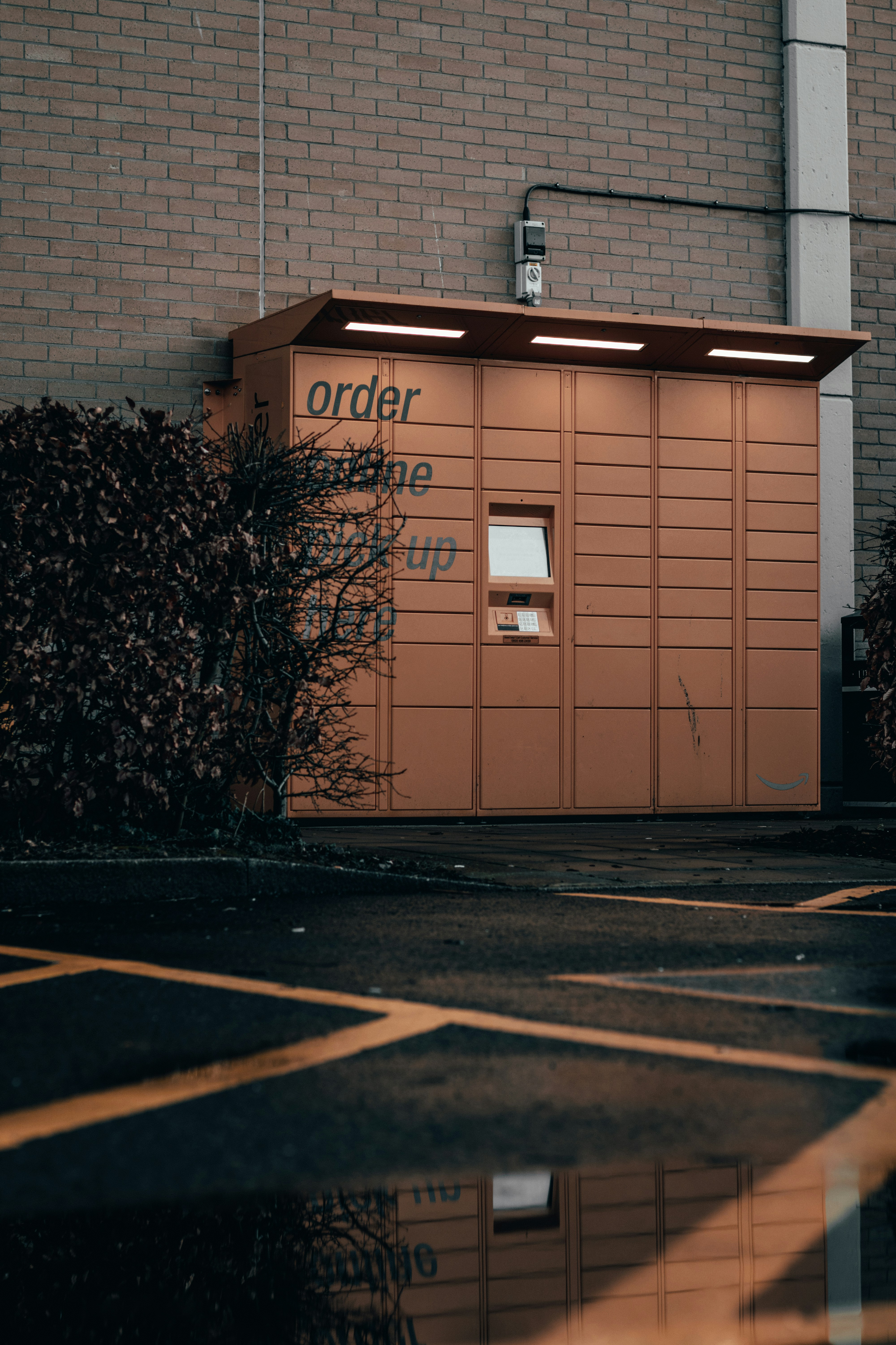 An Amazon Locker. A Godsend. (Photo by Alex Motoc on Unsplash)