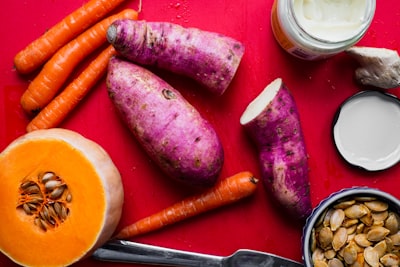 sweet potato, carrots, and squash sweet potato teams background