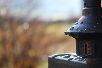 Close-up of a rustproof solar light with water droplets, showcasing IP65 waterproof quality.