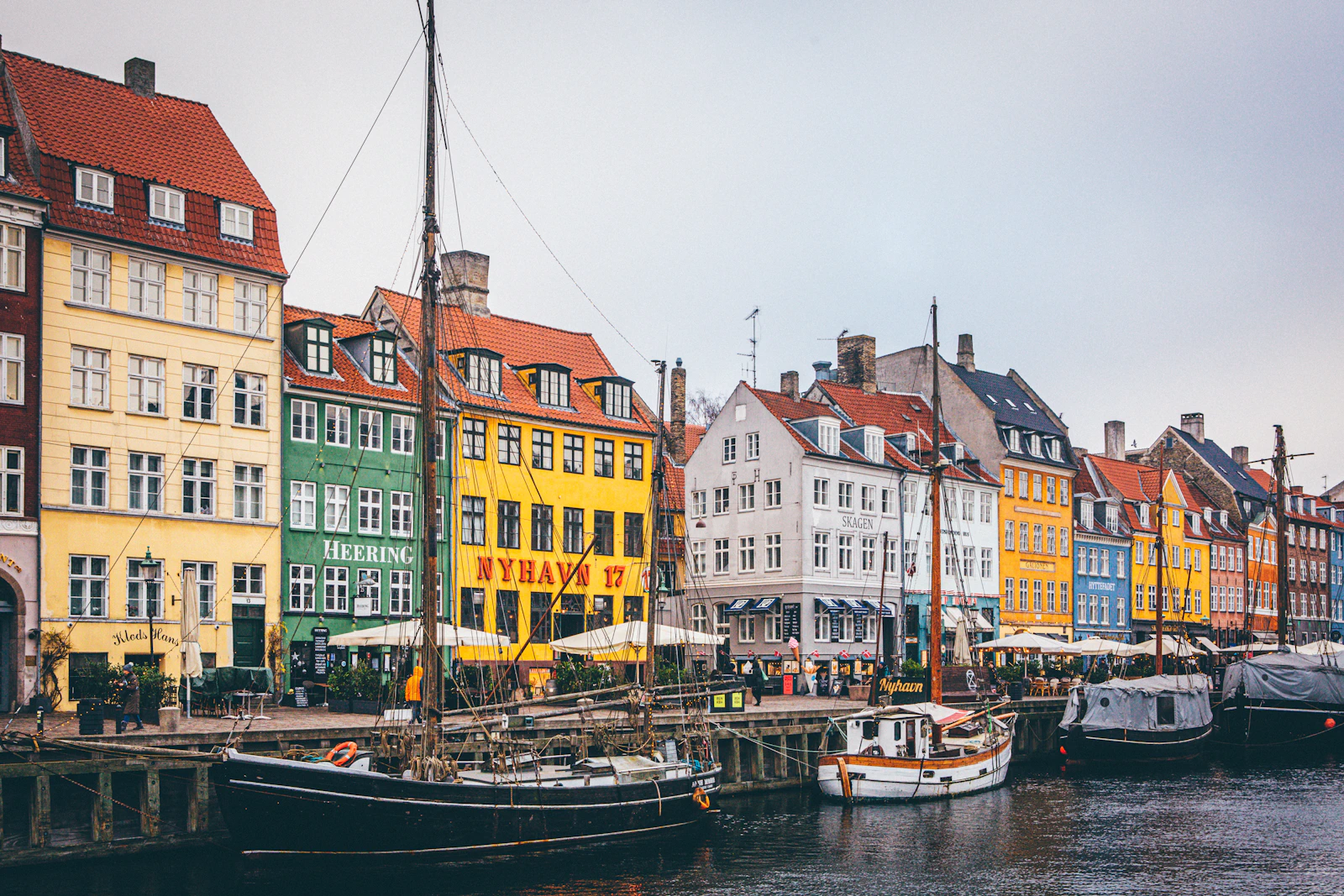 Colourful houses and wooden boats lining Copenhagen's Nyhavn