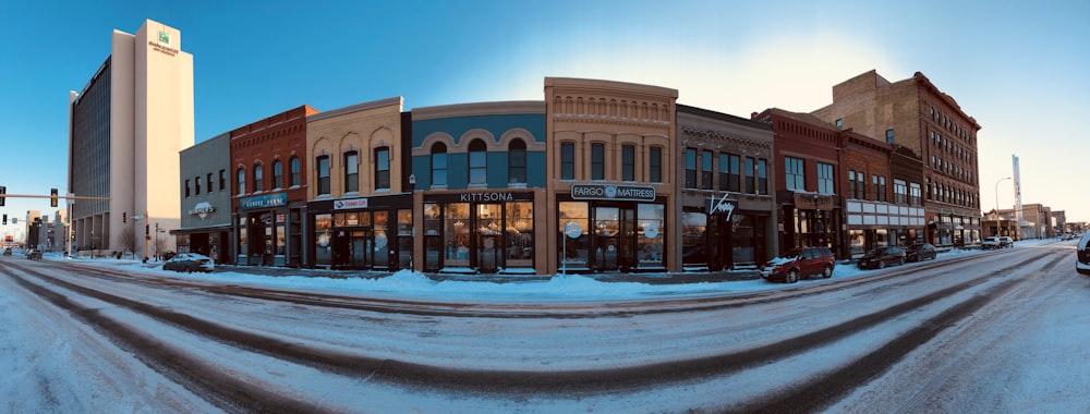 panoramic photography of a brown concrete building front