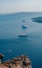 boats on sea during daytime