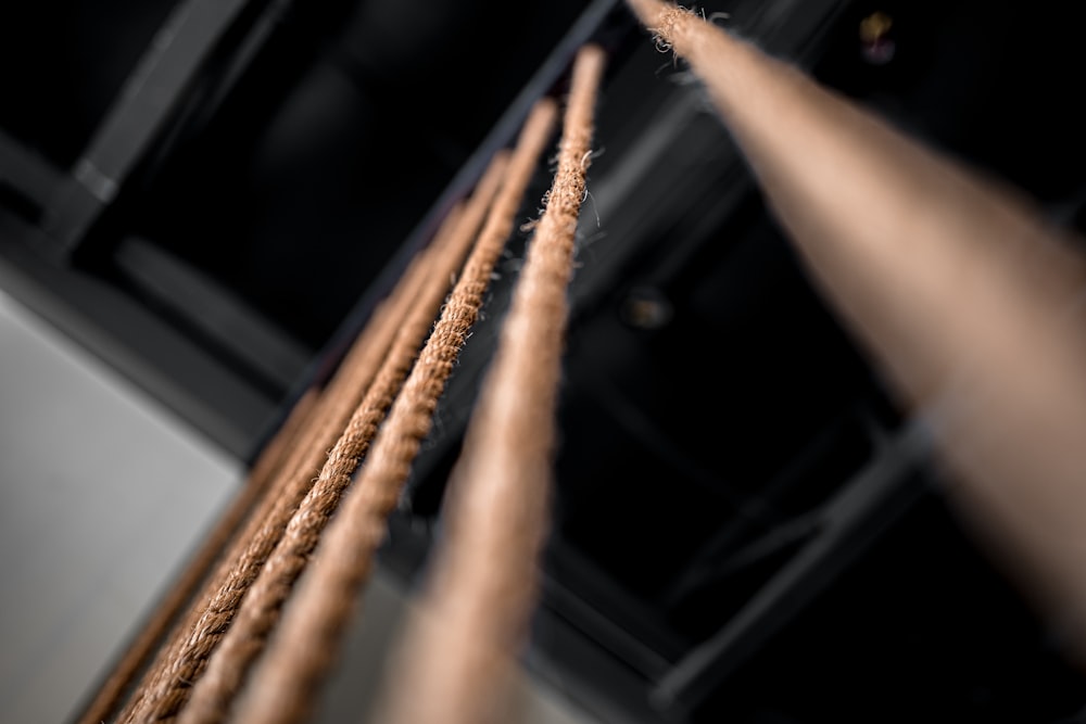 selective focus photography of brown ropes