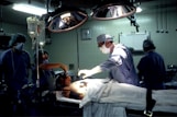 doctor and nurses inside operating room