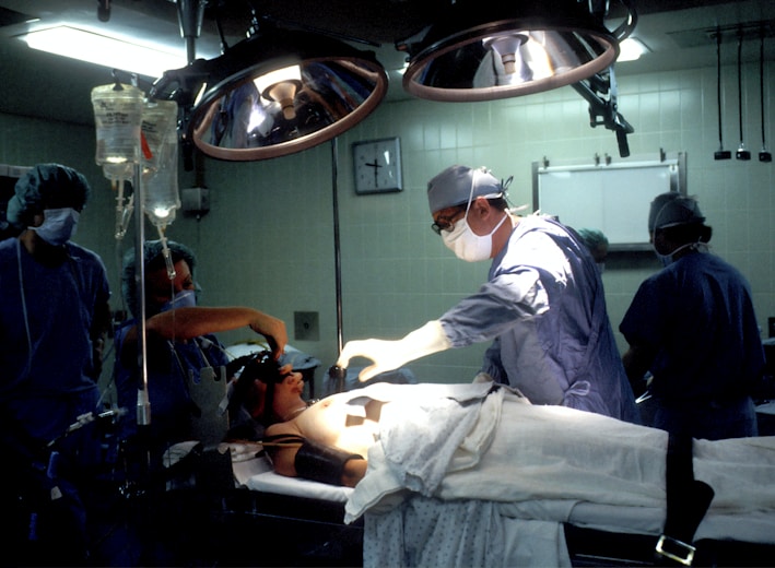 doctor and nurses inside operating room