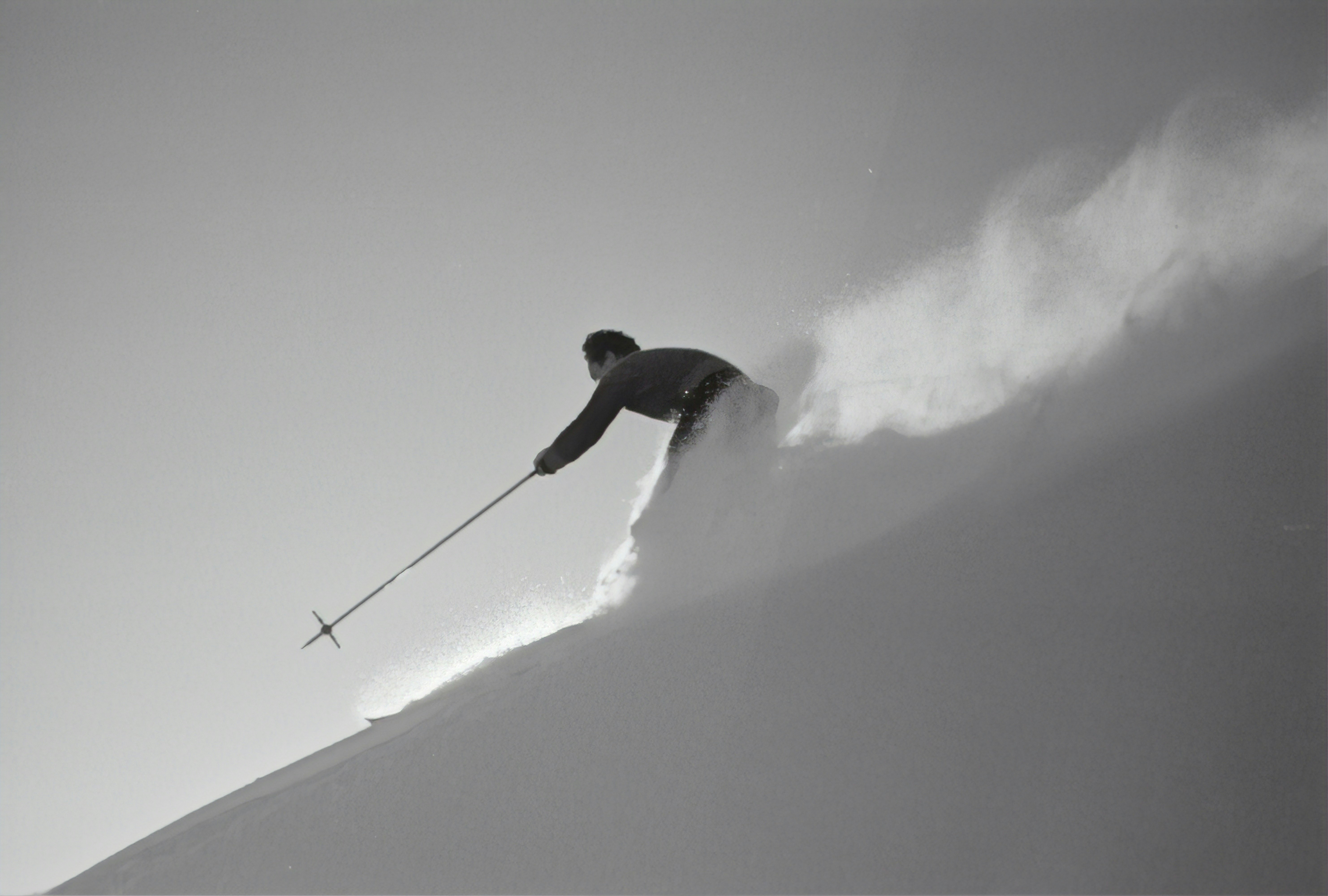 Skier carving turns at Winter Park Resort
