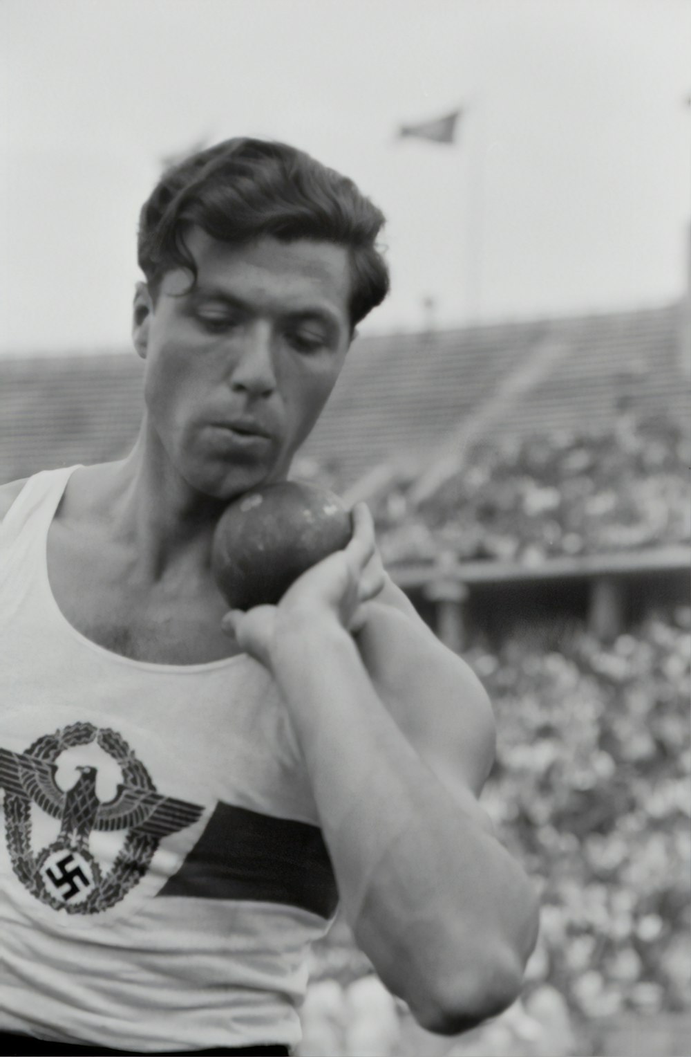 man holding discus ball