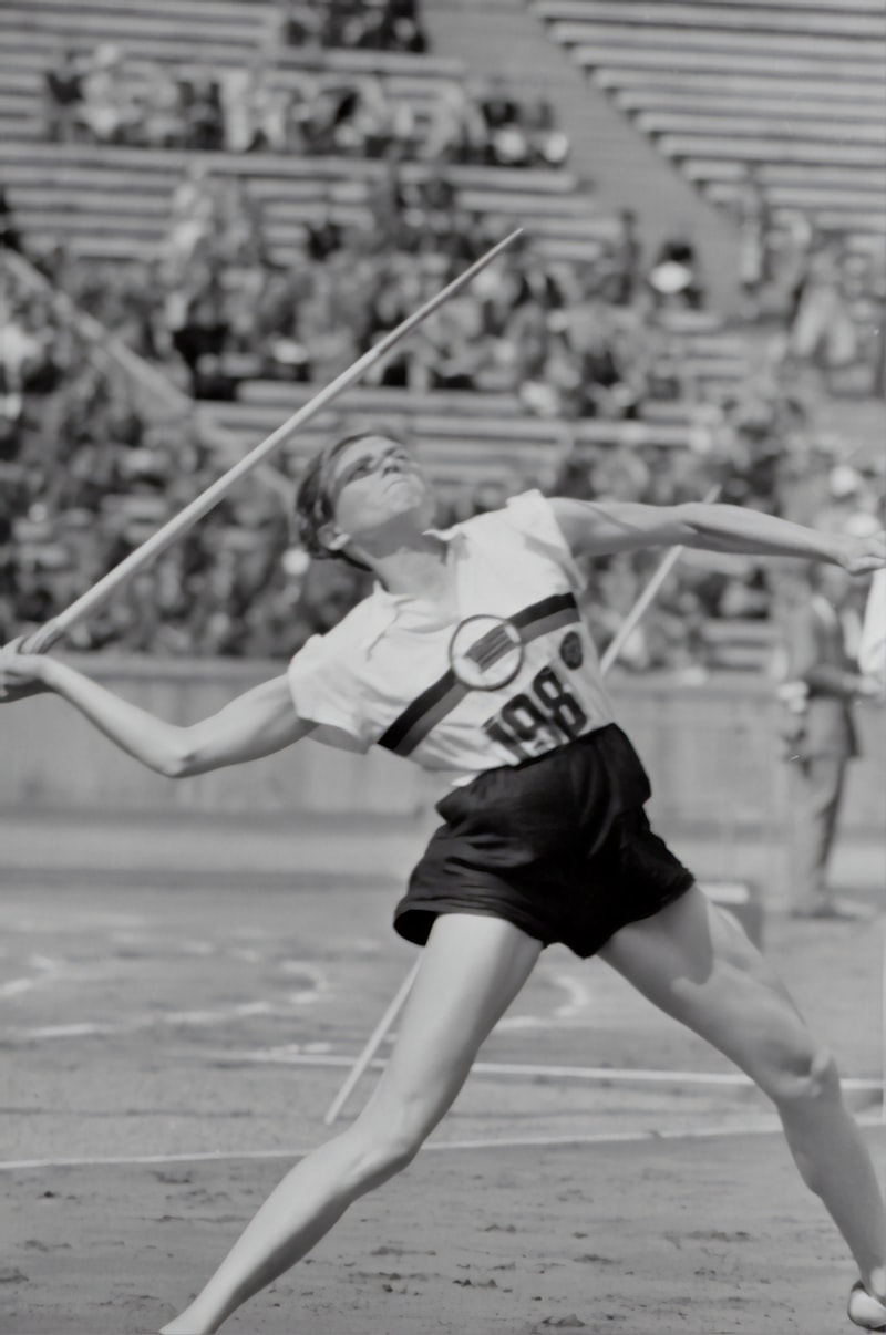 javelin throw, athletic training, South Africa landscape, track and field stadium, Olympic athlete