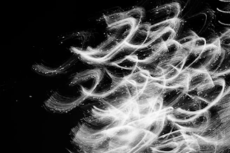 A subtle ripple in the fabric of space-time illustrated with cosmic light trails.