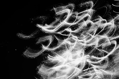 A subtle ripple in the fabric of space-time illustrated with cosmic light trails.