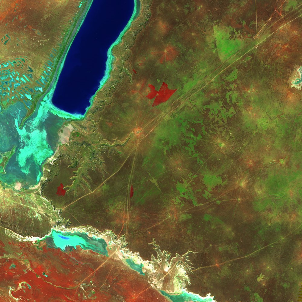 a satellite image of a body of water surrounded by land