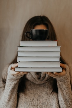 woman holding book