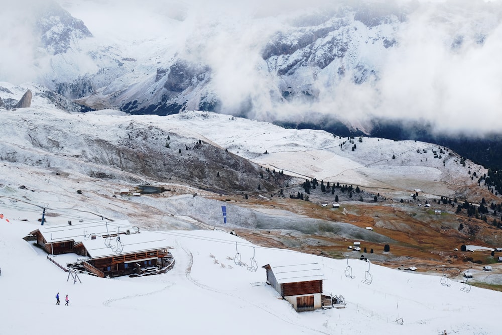 in distant photo of buildings covered by snow