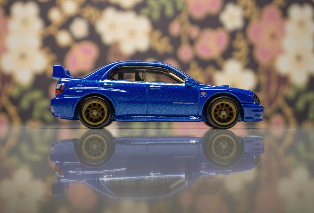 blue sedan diecast toy