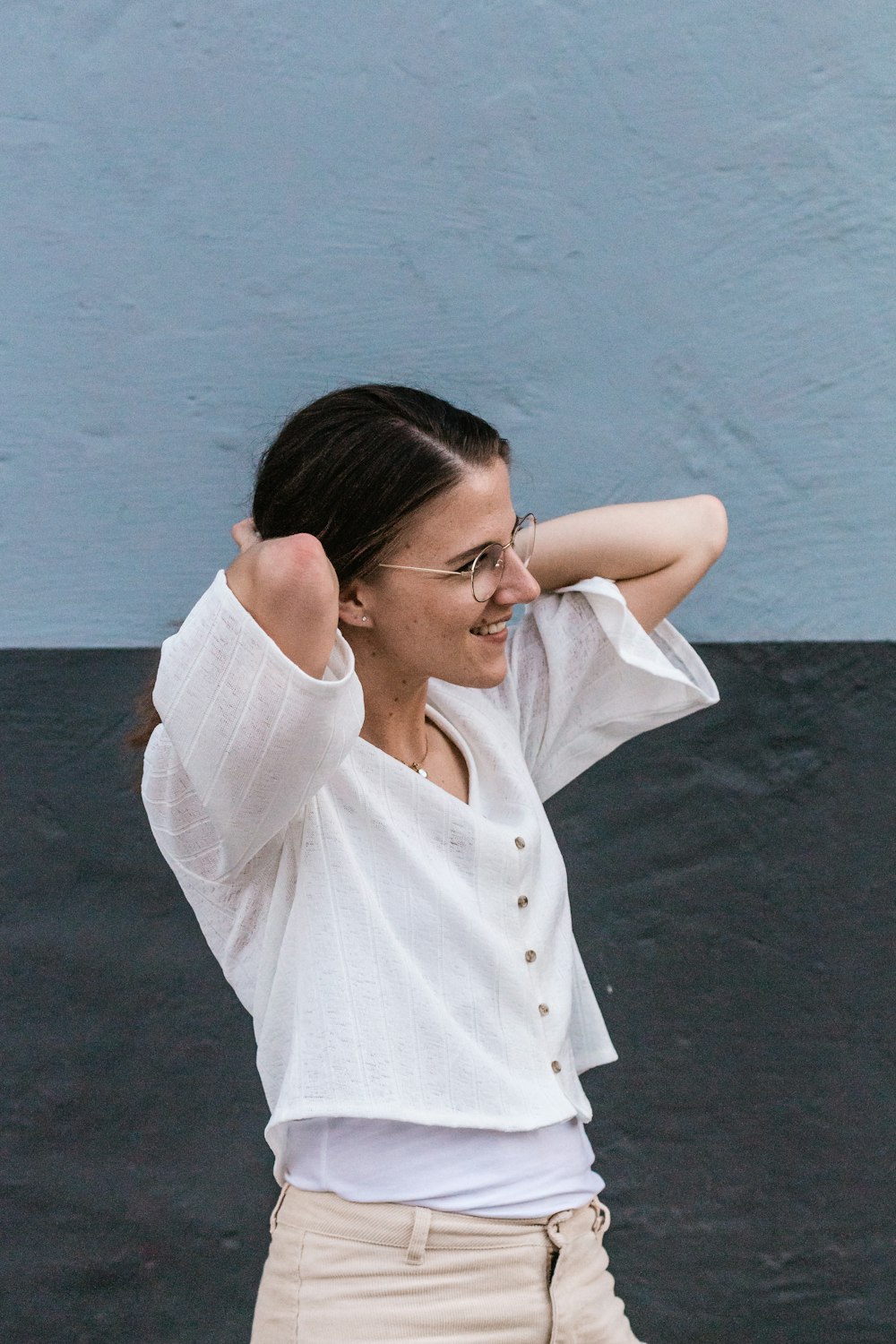 woman fixing her hair