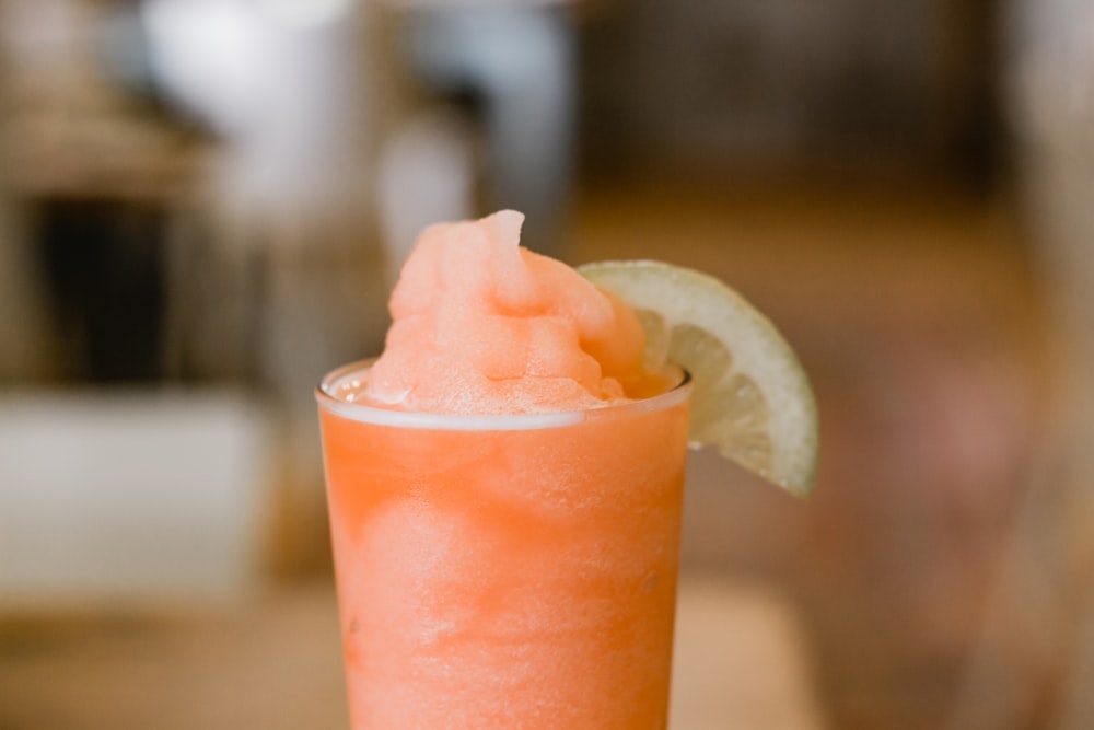 selective focus photo of glass of fruit shake