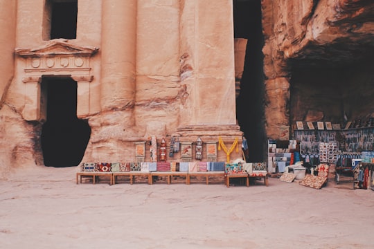 assorted-color scarf in front of temple in Nabatean Theatre Jordan