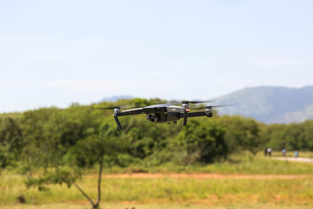 selective focus photography of drone during flight