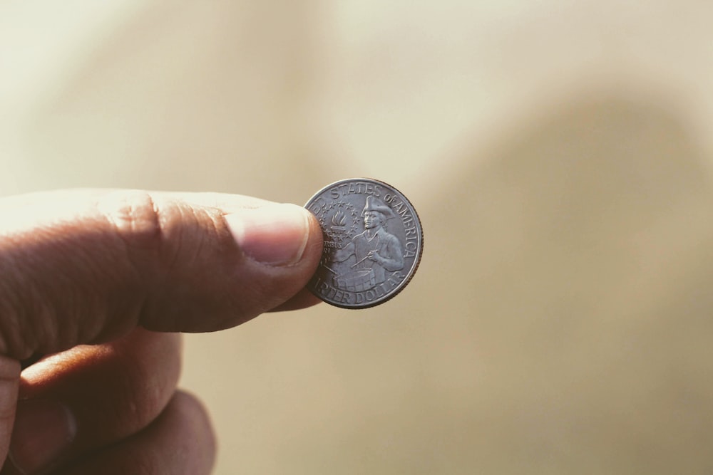 round silver-colored coin