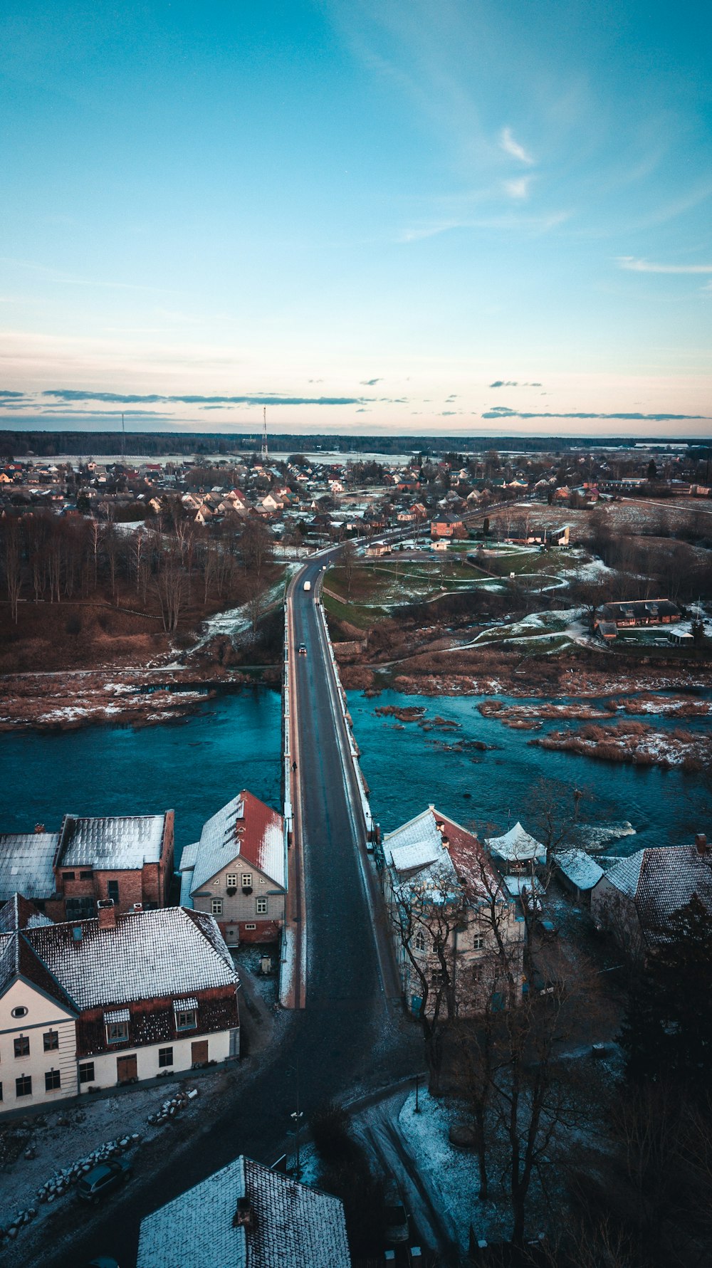 bridge and buildings during daytime