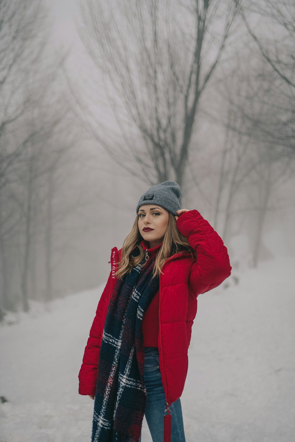 woman in red jacket