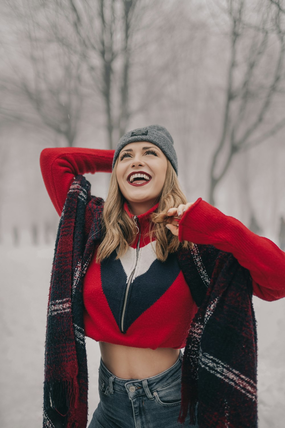 woman wearing red and black top