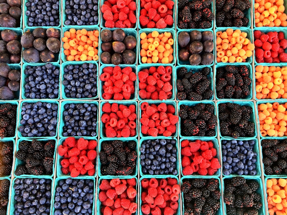 teal display organizers of assorted berries