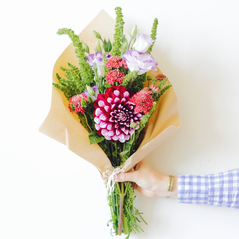 The Wildflower Bundle — loose wildflowers wrapped in kraft paper