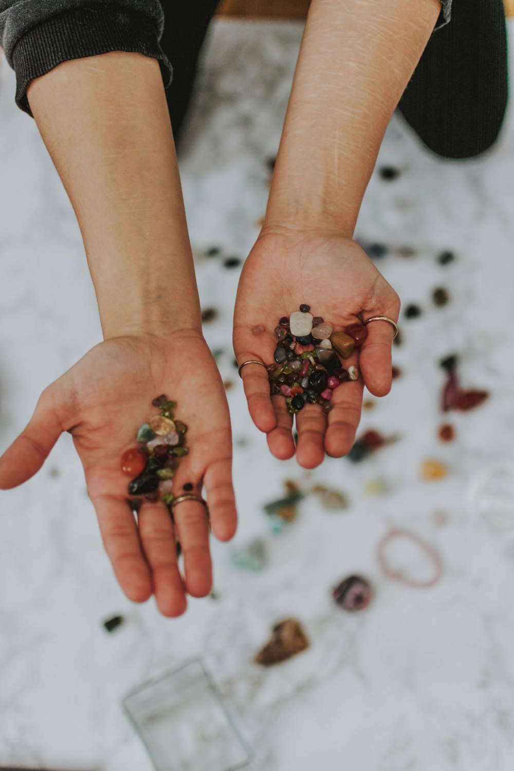 person holding pebbles