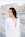 woman wearing white V-neck long-sleeved dress