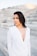 woman wearing white V-neck long-sleeved dress
