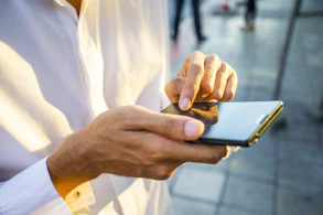 person using black Android smartphone