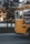 A school bus parked outside a school.