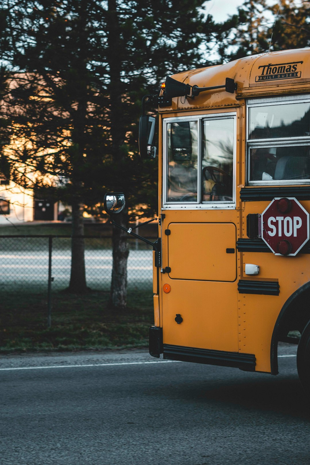 yellow bus on the road photograph