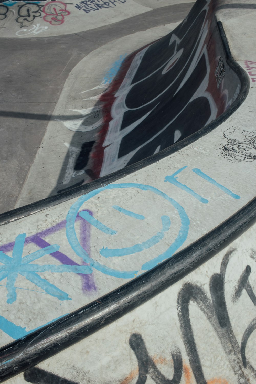 a man riding a skateboard up the side of a ramp