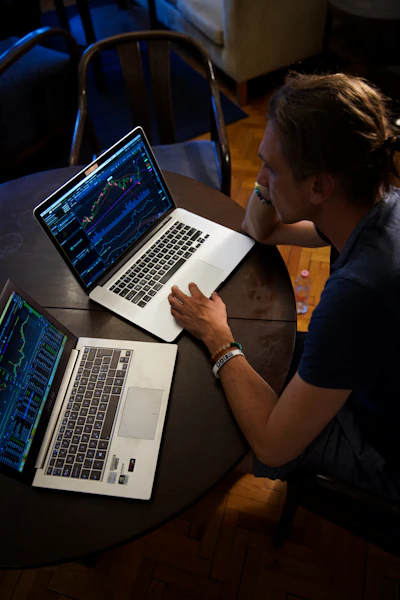 Trader working on a laptop