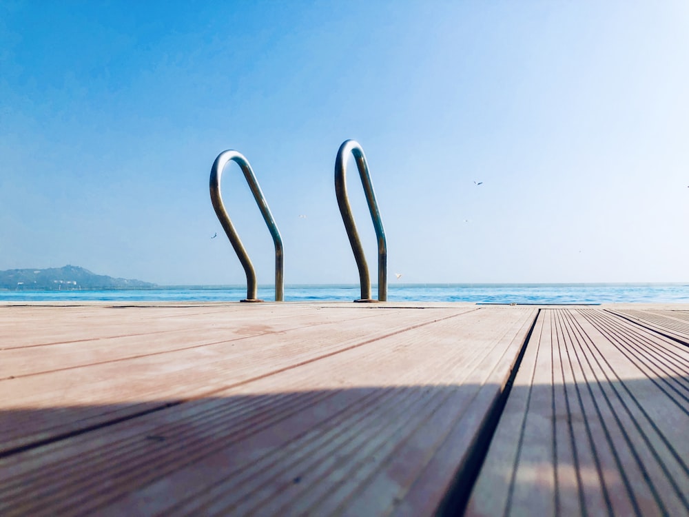 brown wooden ocean dock