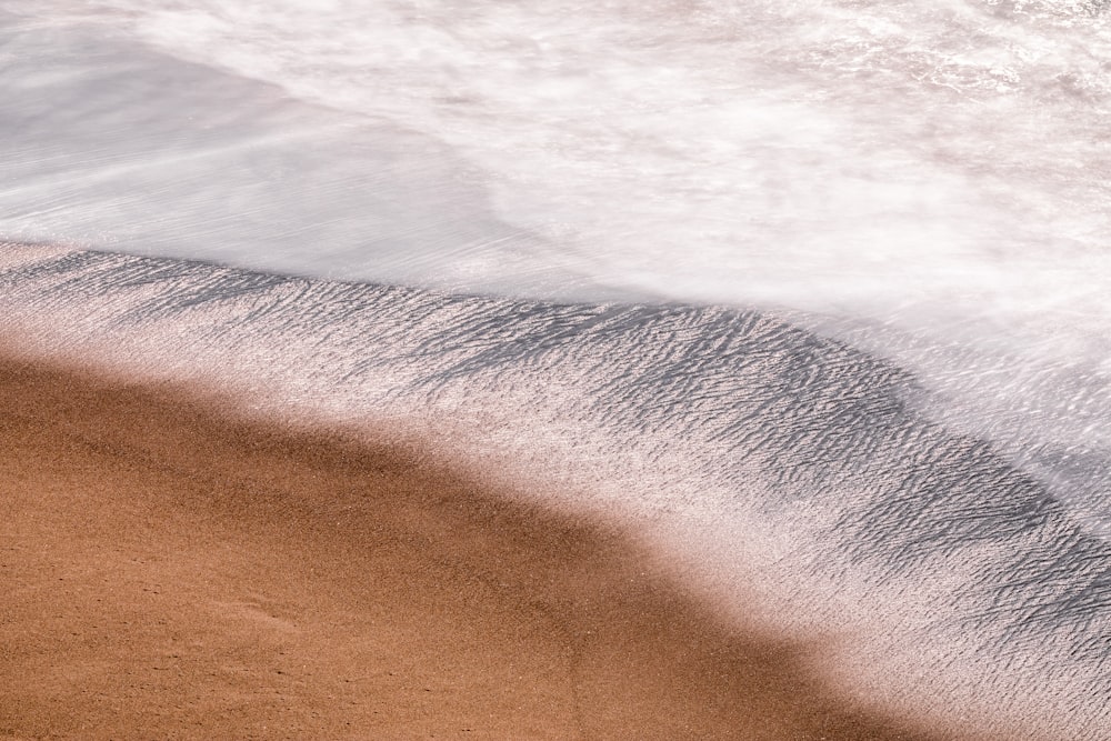 sea waves crashing on shore