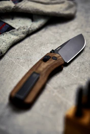 brown and black pocketknife