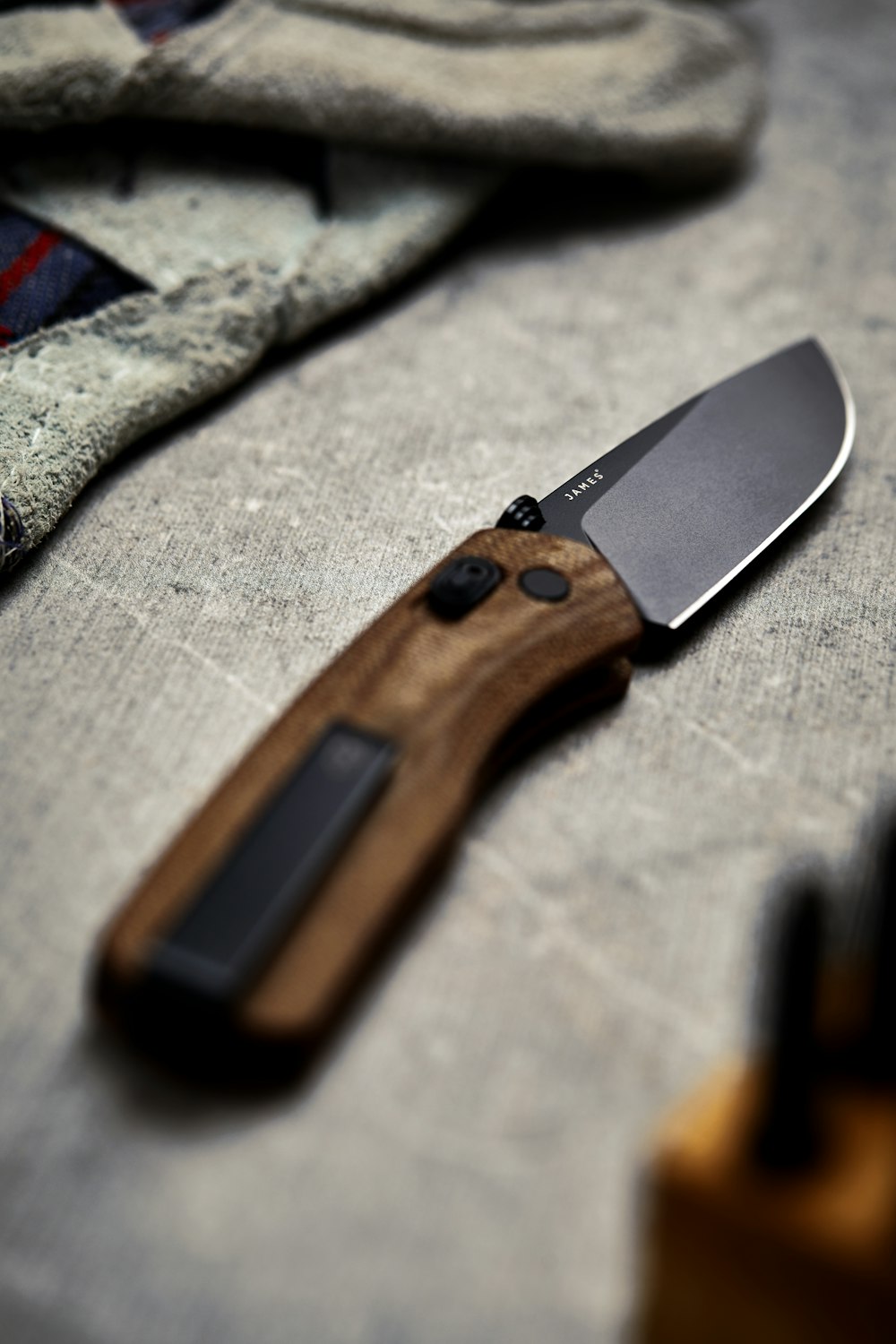 brown and black pocketknife