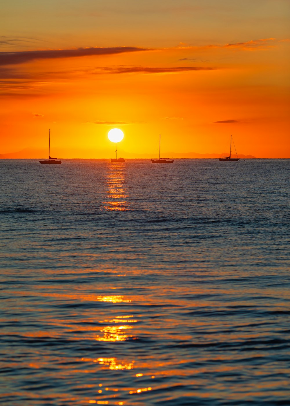 calm body of water during golden hour