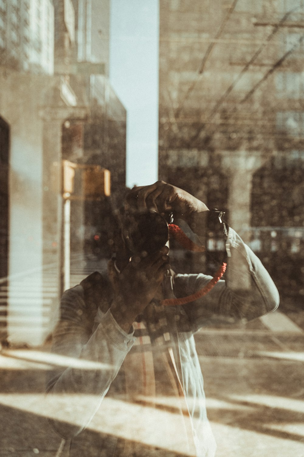 man holding digital camera