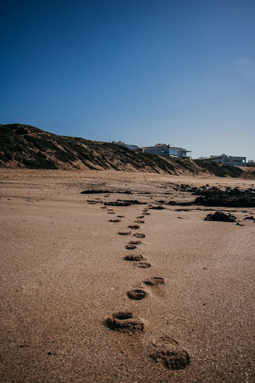 footstep on brown sand