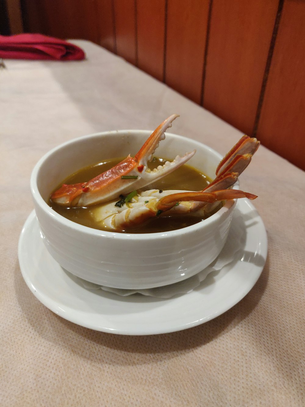 cooked crab in white ceramic bowl