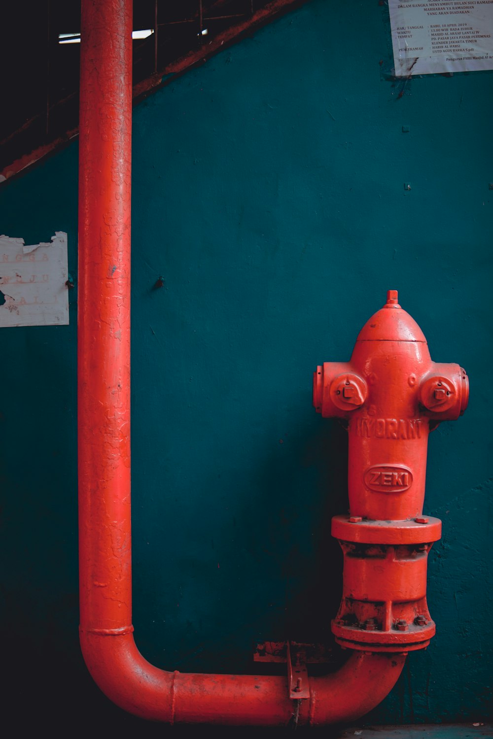 red pipe on wall