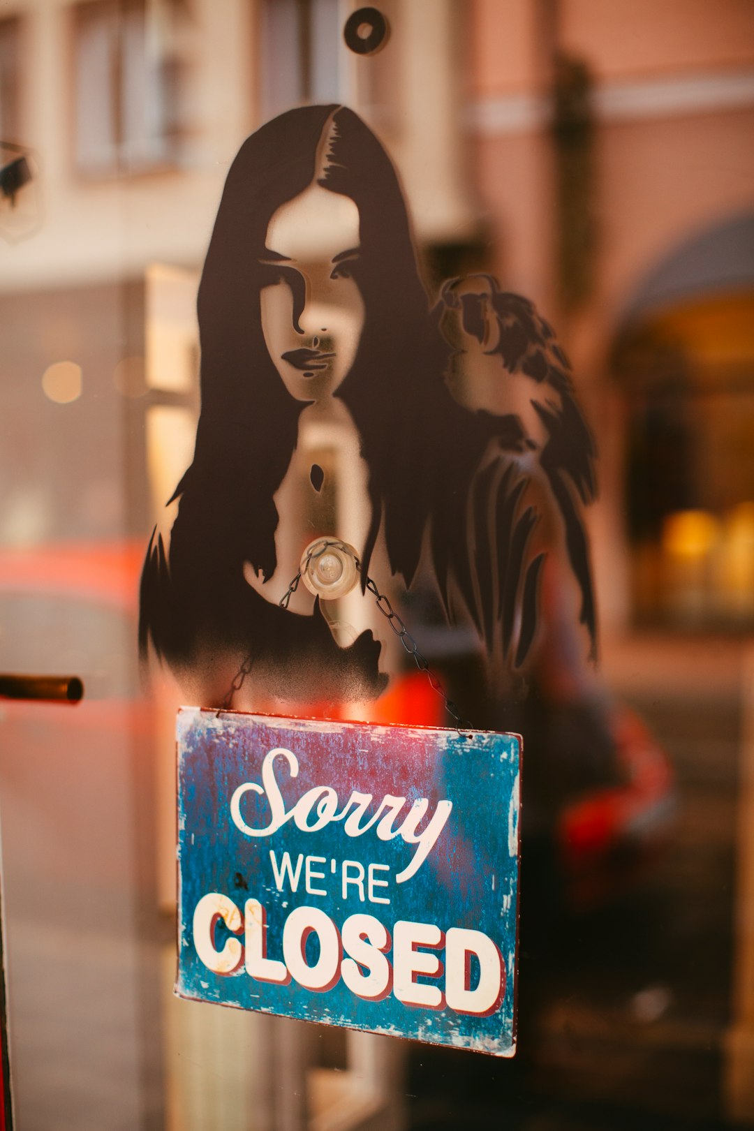 selective focus photography of Sorry We're Closed sign