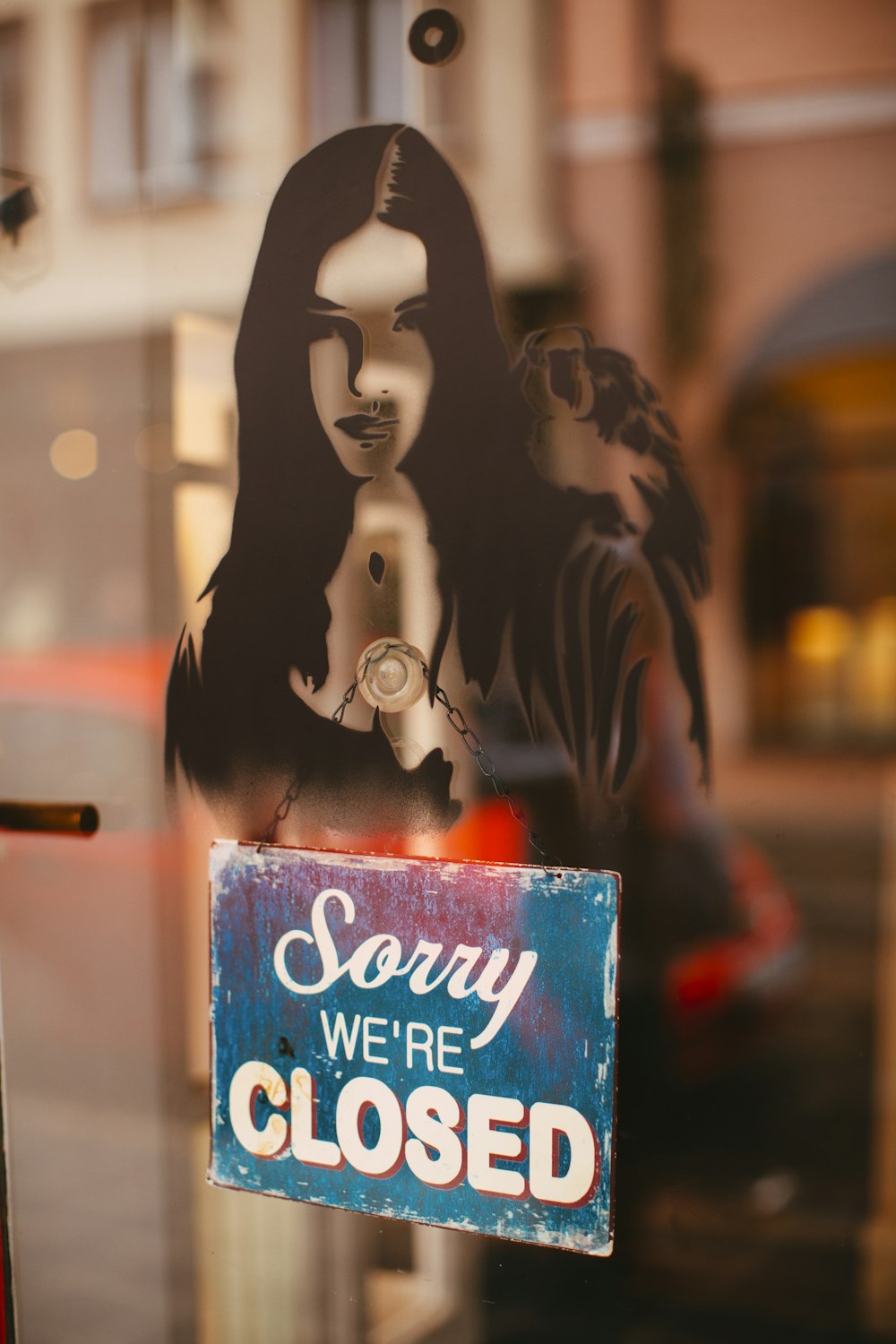 selective focus photography of Sorry We're Closed sign