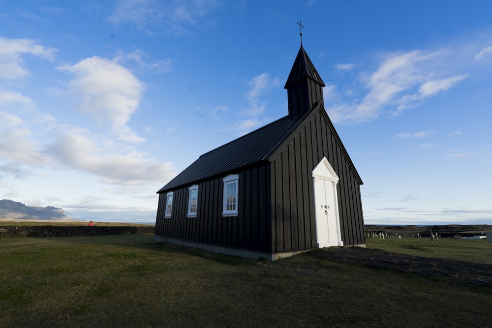 gray and white wooden church during daytime